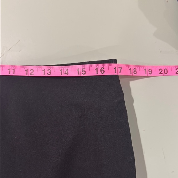 Black Mini Pencil Skirt with Ruffled Hem, Zipper & Button Closure - Picture 6 of 9